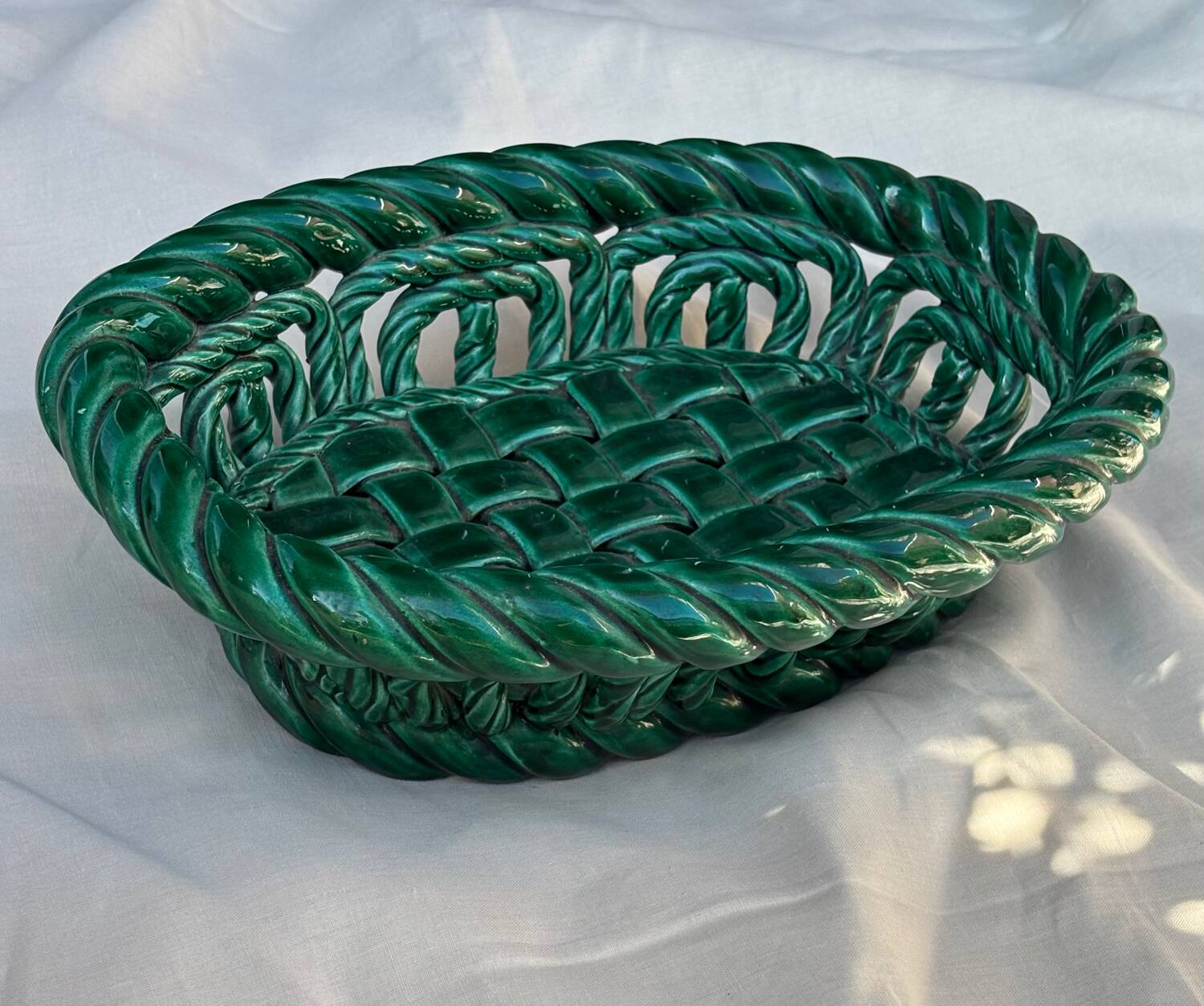 Green woven ceramic basket