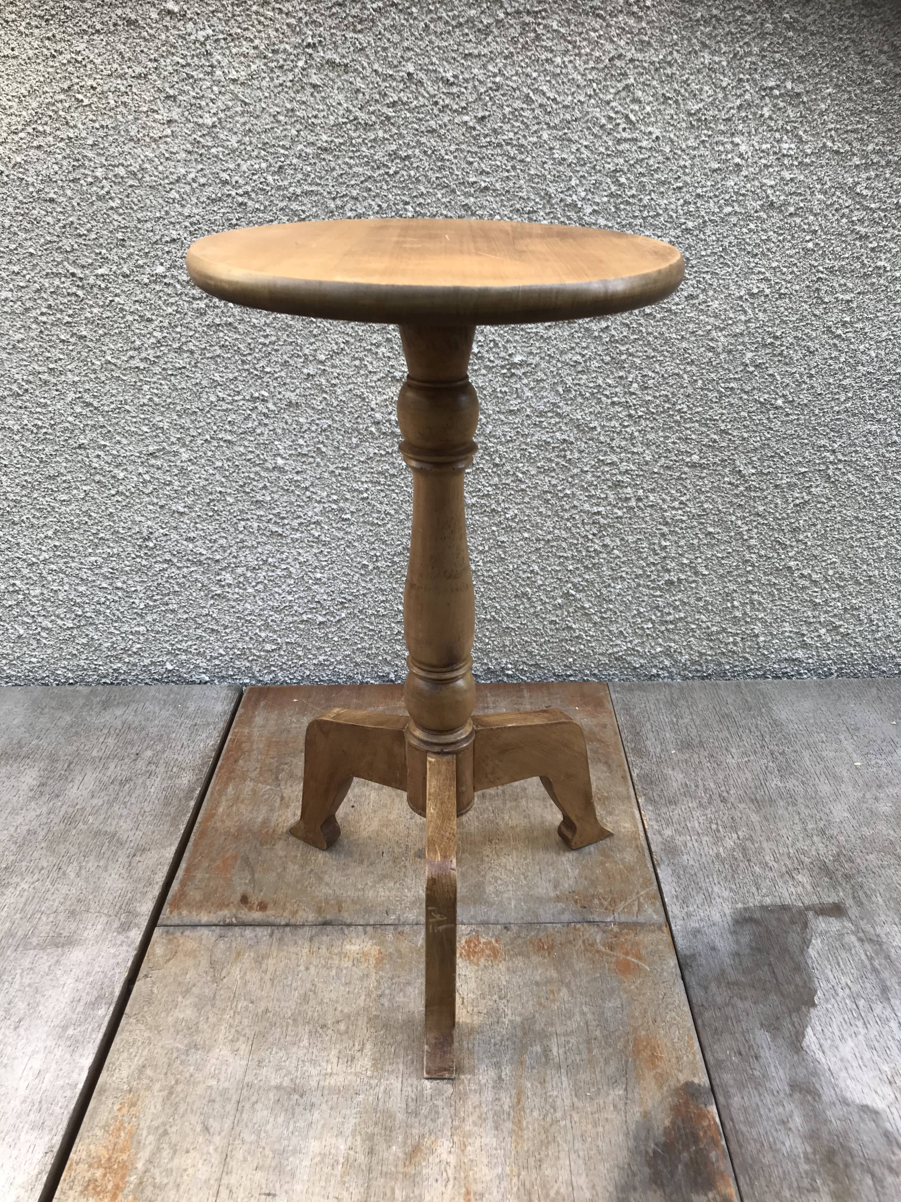 Old vintage wood tripode table