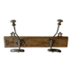 Pair of antique wrought iron coat hooks mounted on a wooden panel, 19th century