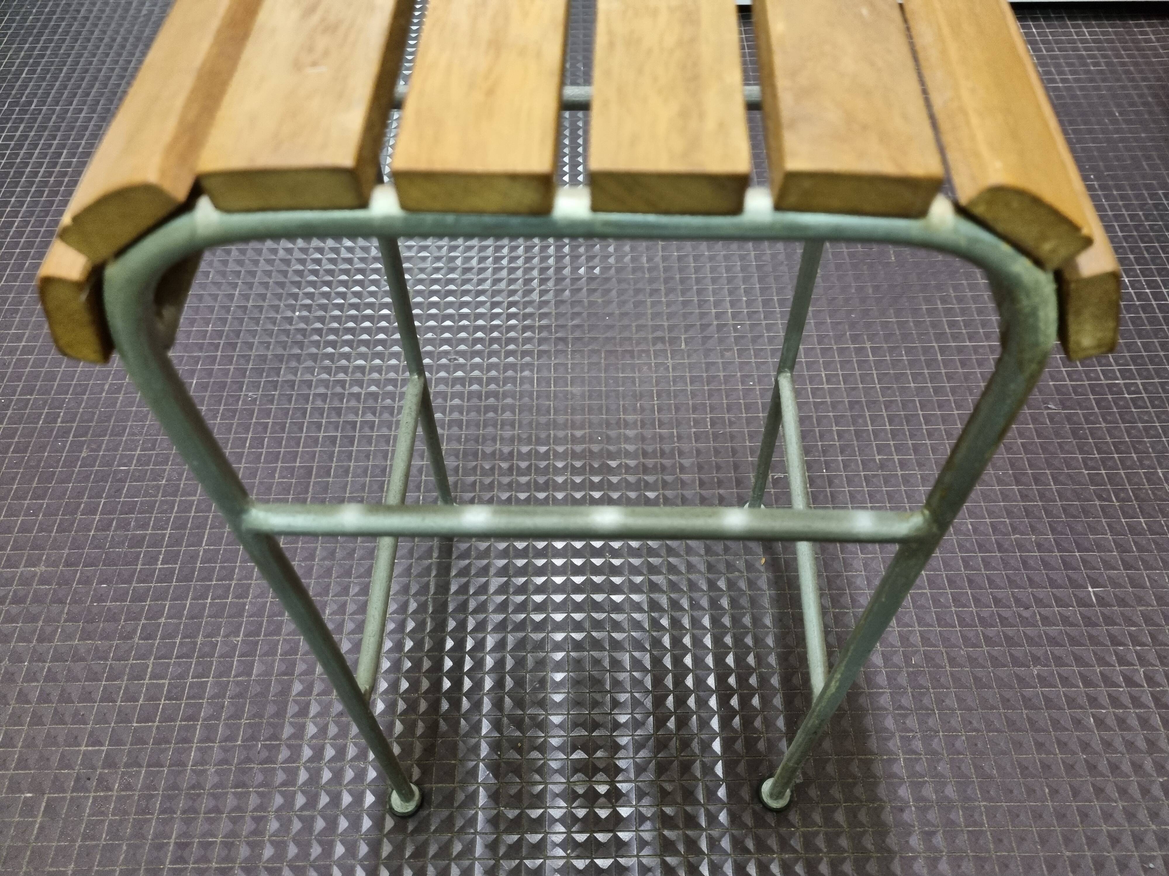 Vintage bar stool made of wood and metal