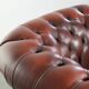 Cowhide Chesterfield armchair in a classic English style