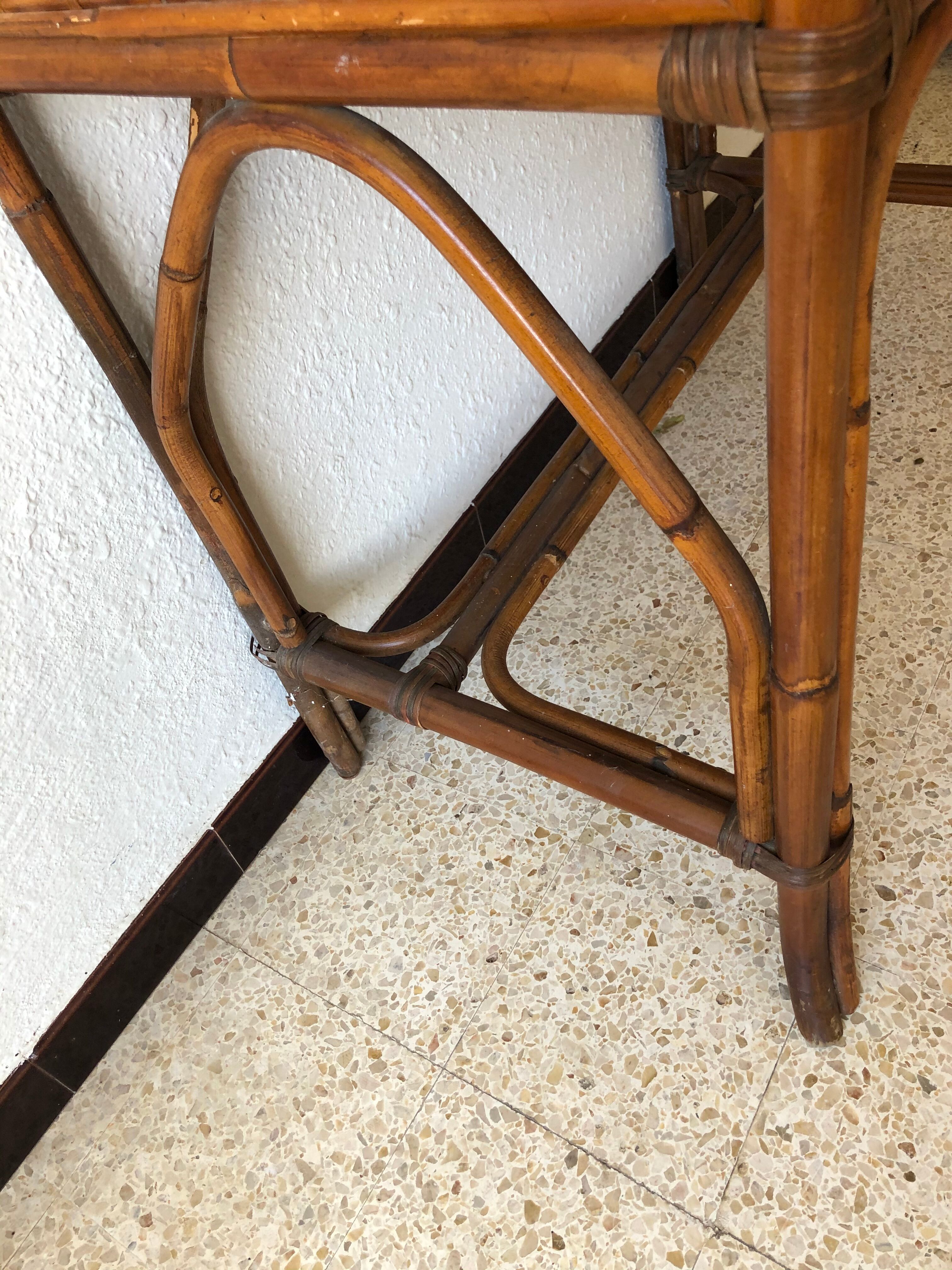 Console/small old desk in rattan