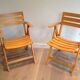 Pair of varnished wooden folding armchairs signed Clairitex.