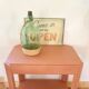 Vintage glass and raffia carboy