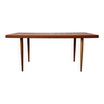 1970s coffee table with a tapered teak base and ceramic mosaic.