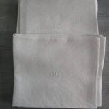12 large old damask napkins, monogrammed