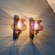 Pair of wall sconces in brass and smoked glass, 1960s.