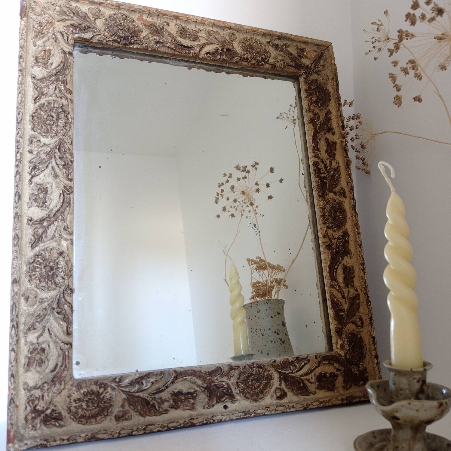 Wood and patinated stucco mirror