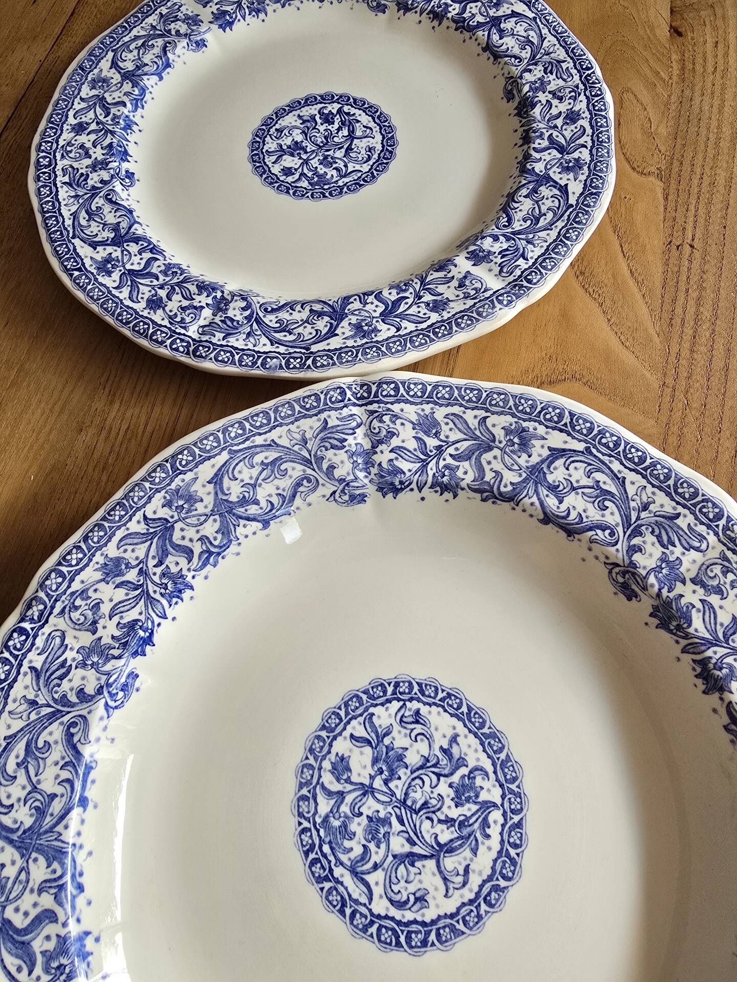 Gien service plates with blue patterns in perfect condition.
