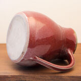 Signed enamelled ceramic pitcher