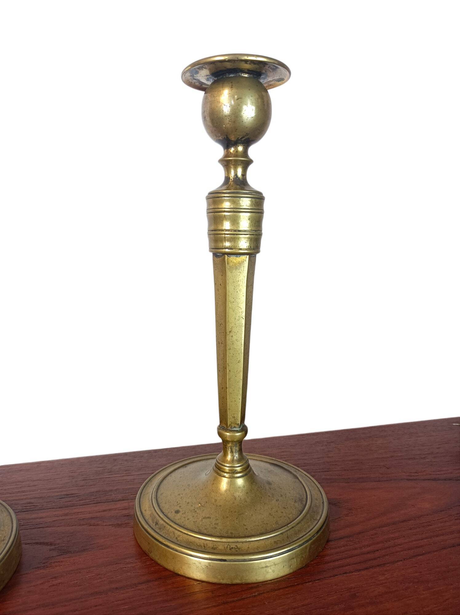 Pair of brass candlesticks, 19th century, neoclassical style.