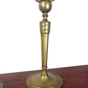Pair of brass candlesticks, 19th century, neoclassical style.