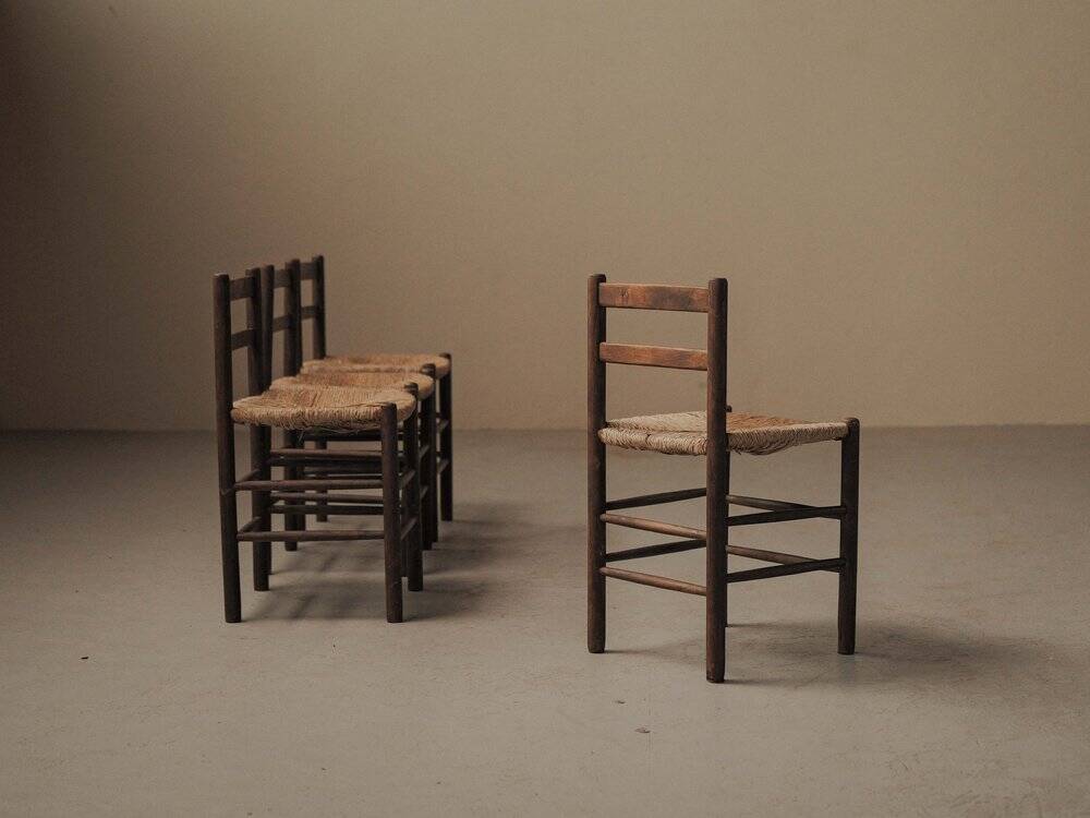 Set of four wooden and straw chairs, around 1960.