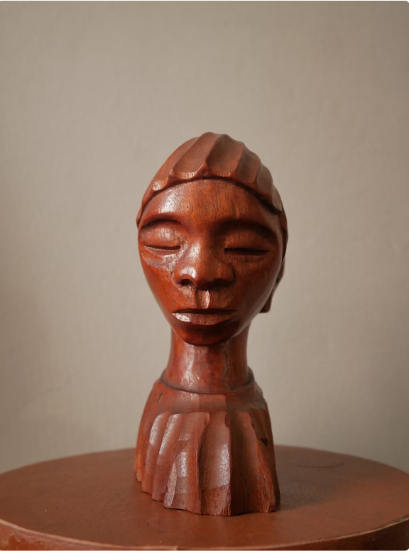 Carved wooden bust