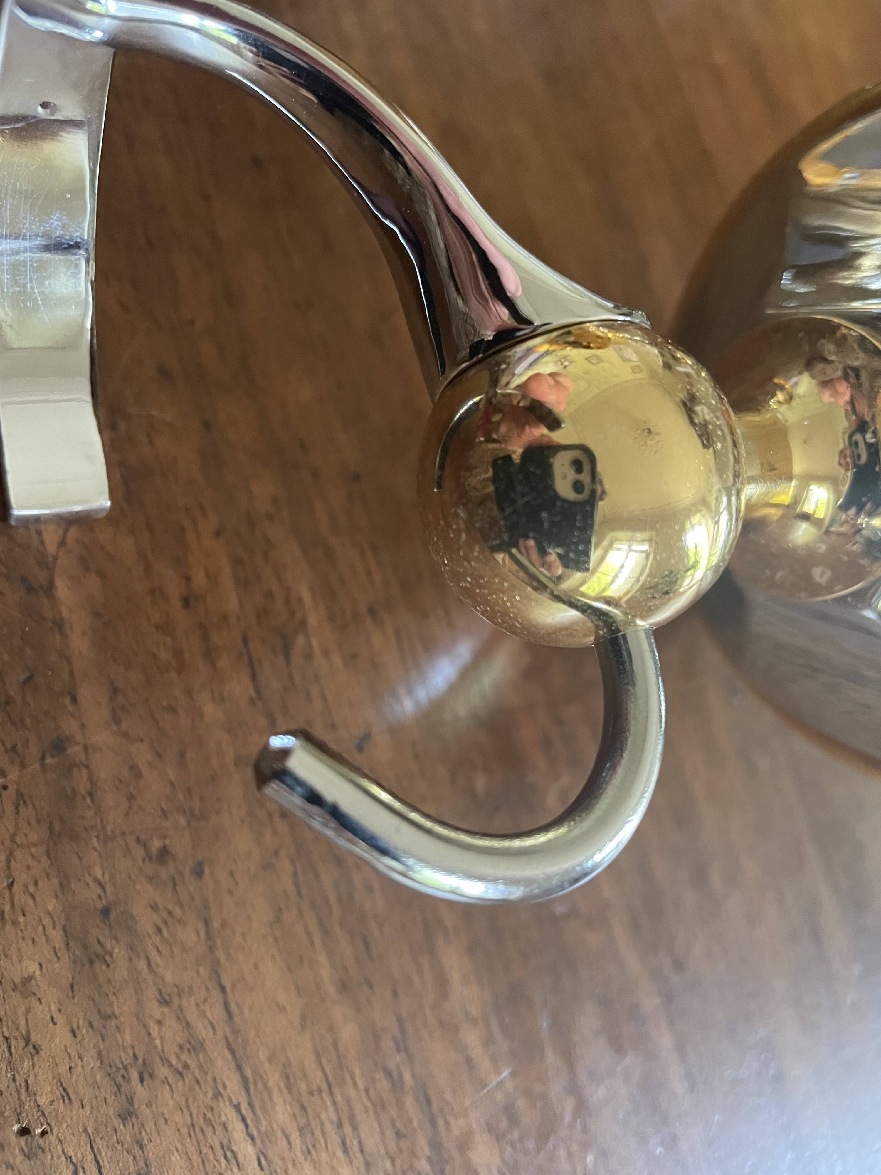 Chrome and gold metal coat rack