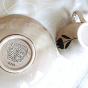 Vintage 23-piece Niderviller coffee set with hand-painted black tulip decor.