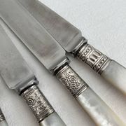 Antique table knives in mother-of-pearl and silver-plated metal