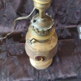 Repoussé brass lamp with floral motifs, decorated with 3 miniature medallions