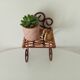Antique wrought iron wall shelf