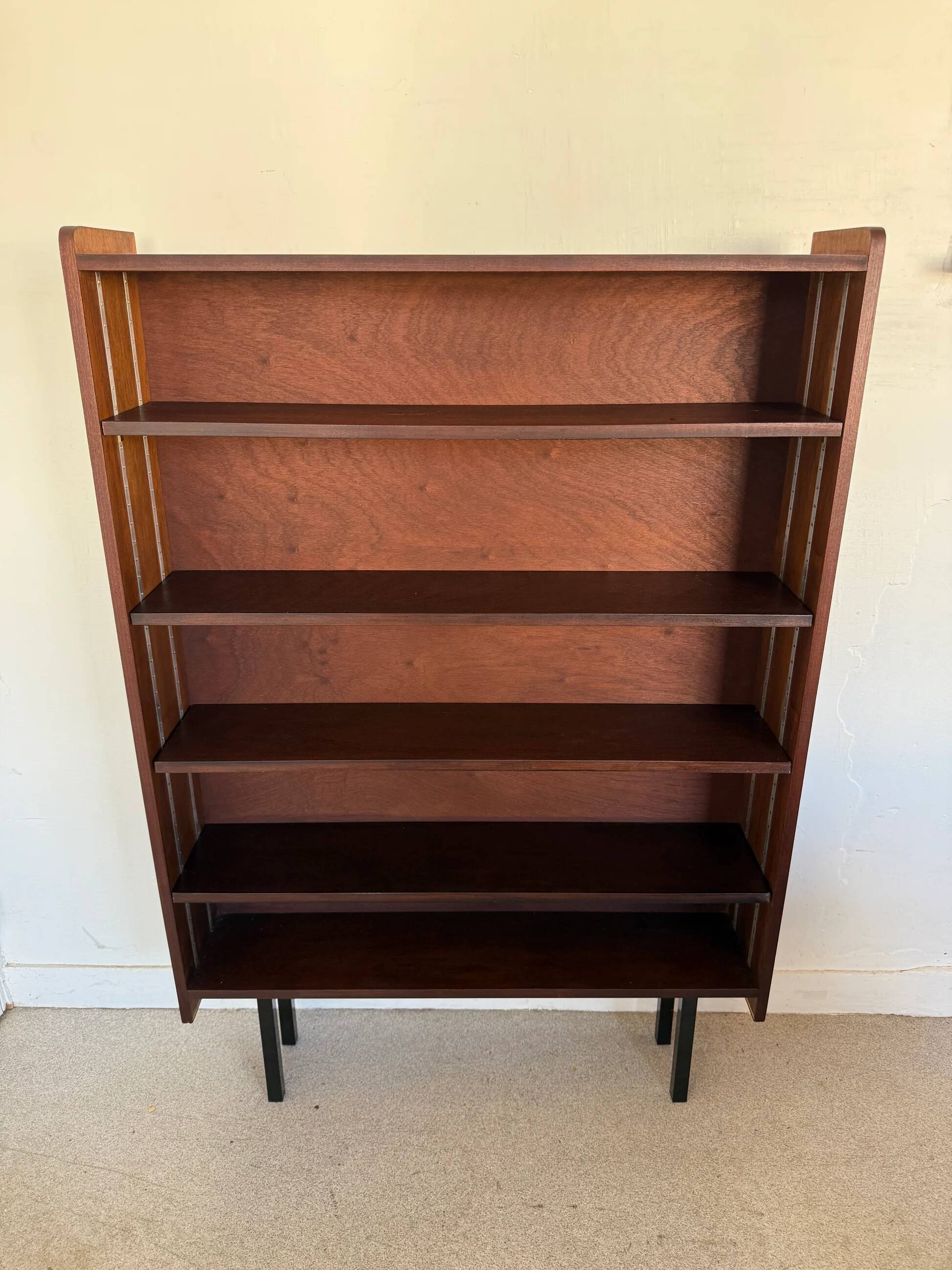 Vintage veneer bookcase with metal legs