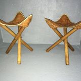 Pairs of leather tripod stools