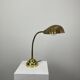French table lamp in brass with a shell-shaped shade from the 1950s.