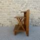 Light wood bedside table with crossbars and 3 shelves, around 1950.