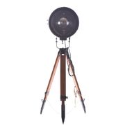 Old industrial spot on wooden tripod