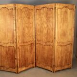 Large cherry wood folding screen with four double-sided panels.