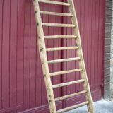 Old vintage wooden animal barrier, wall espalier, plant holder