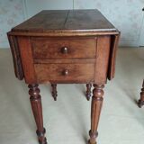 Pair of Louis Philippe style walnut bedside tables / work tables with flap