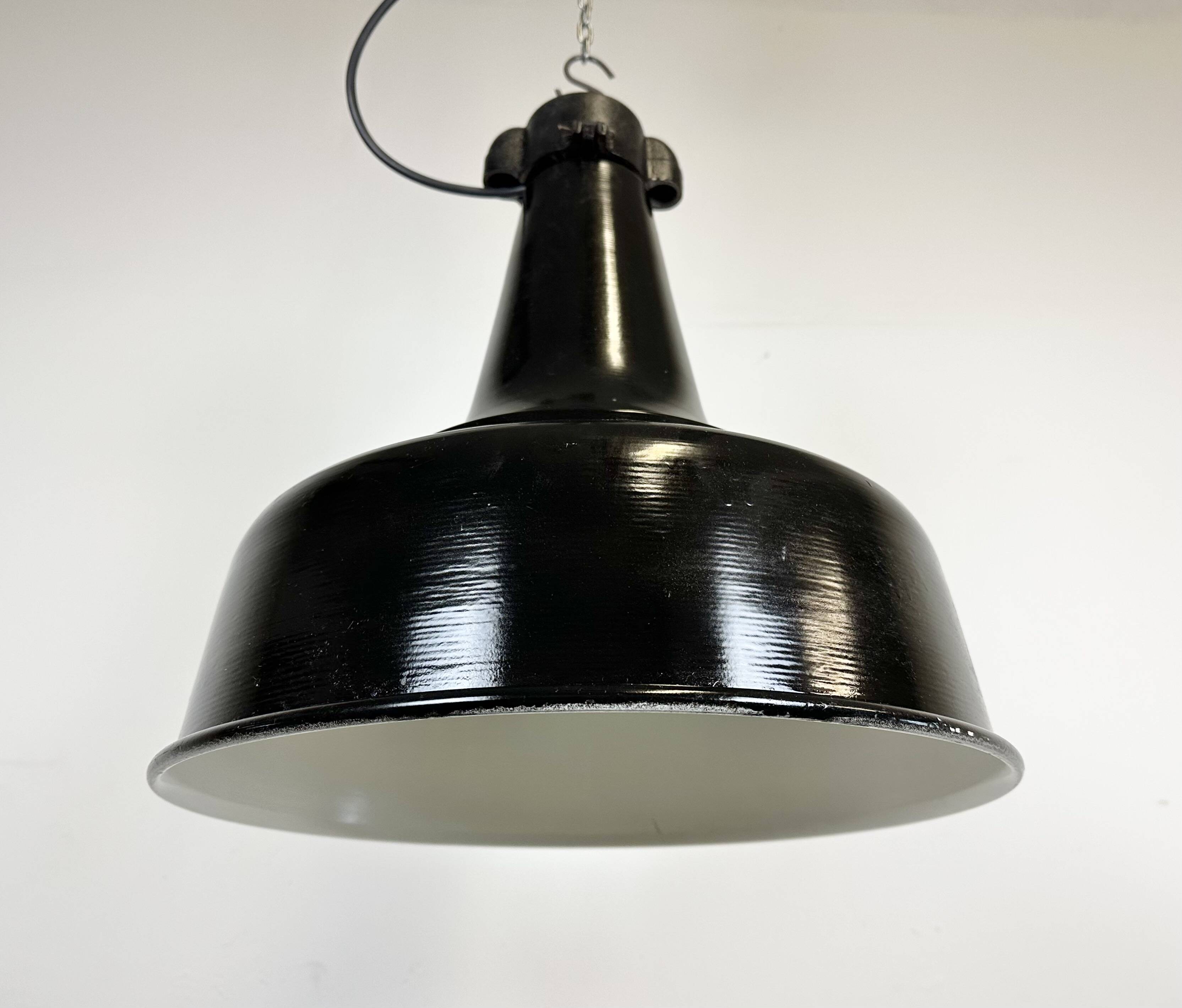 Industrial black pendant factory lamp with cast iron top, 1970s