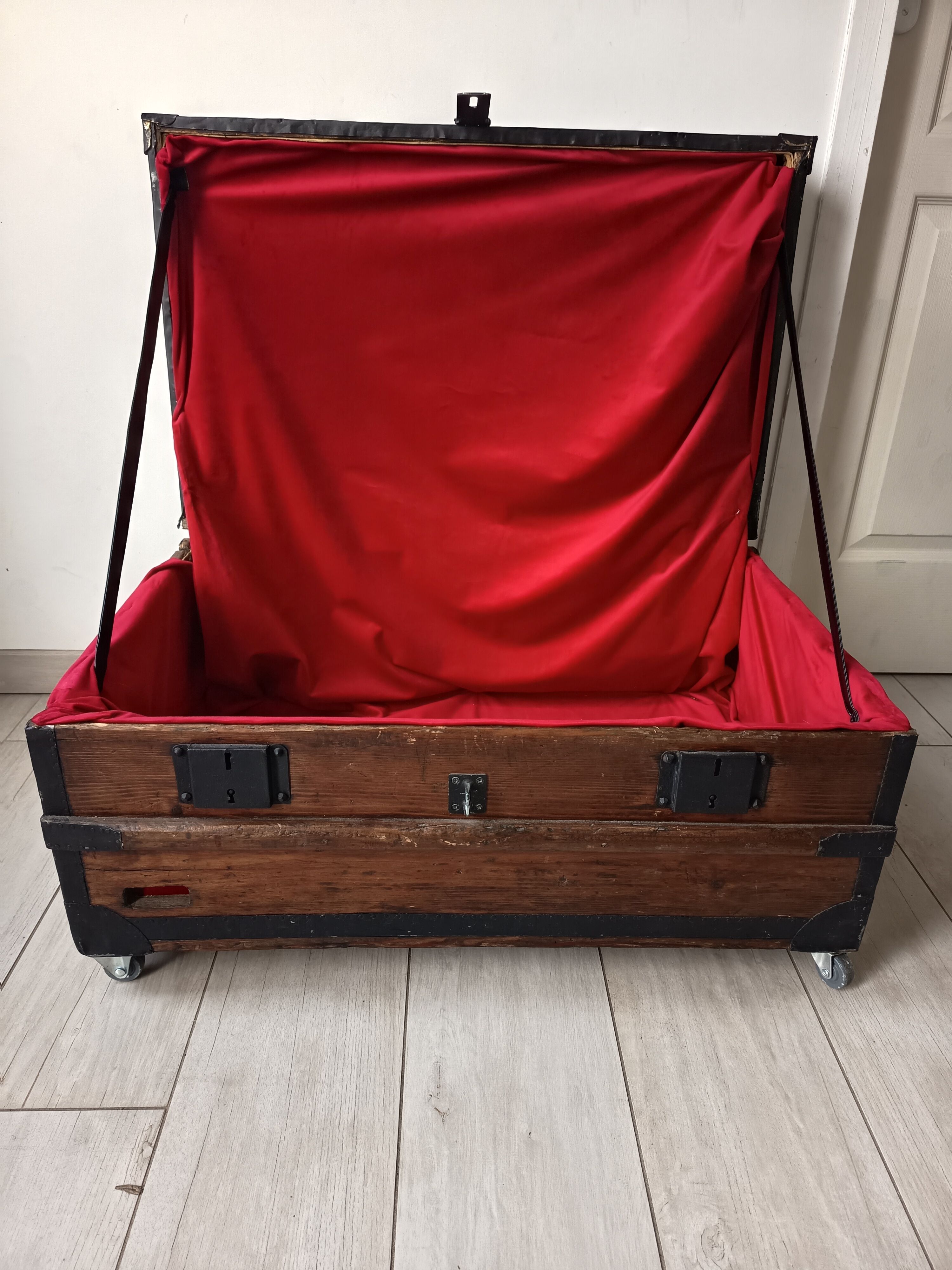 Old trunk with red velvet interior
