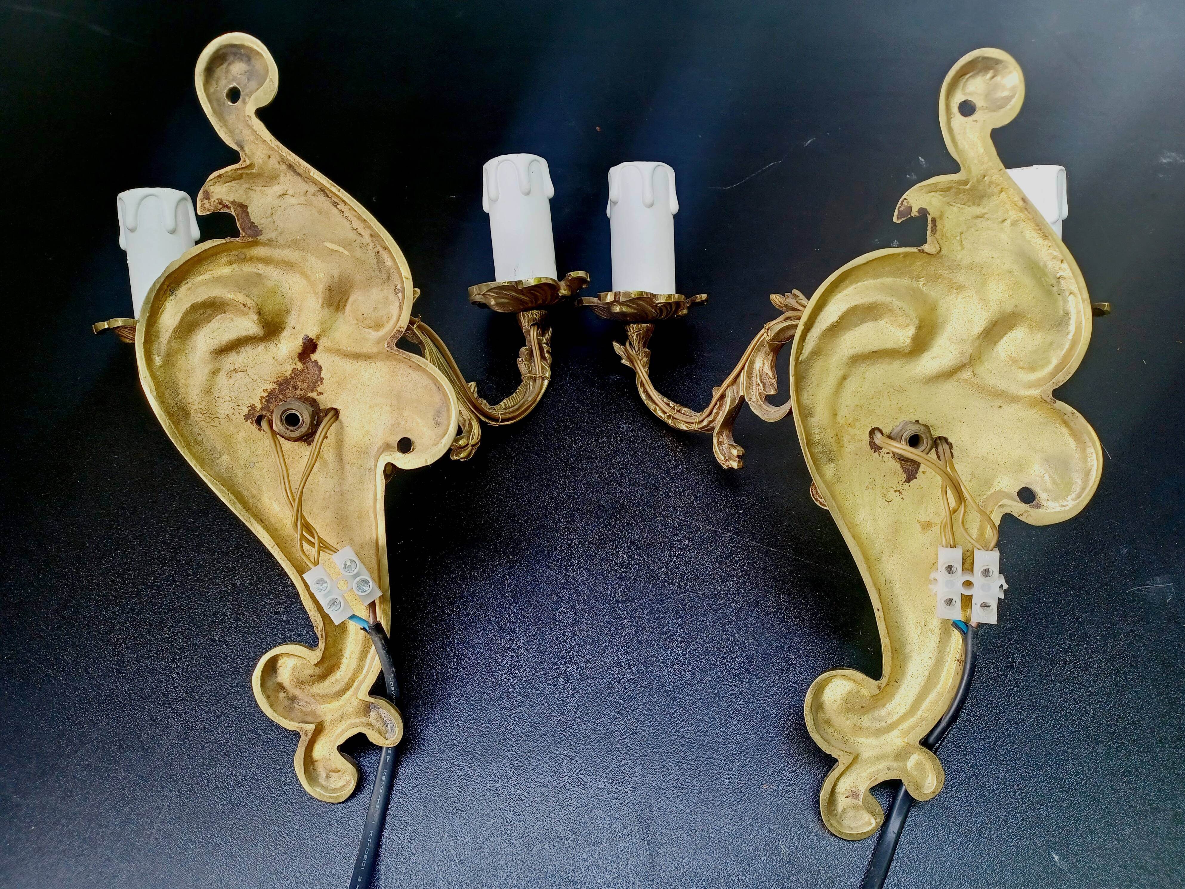 Pair of 2-light bronze wall lights, St. Louis XV
