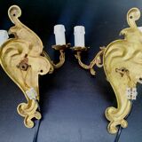 Pair of 2-light bronze wall lights, St. Louis XV