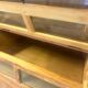 Large antique haberdashery cabinet with glass doors.