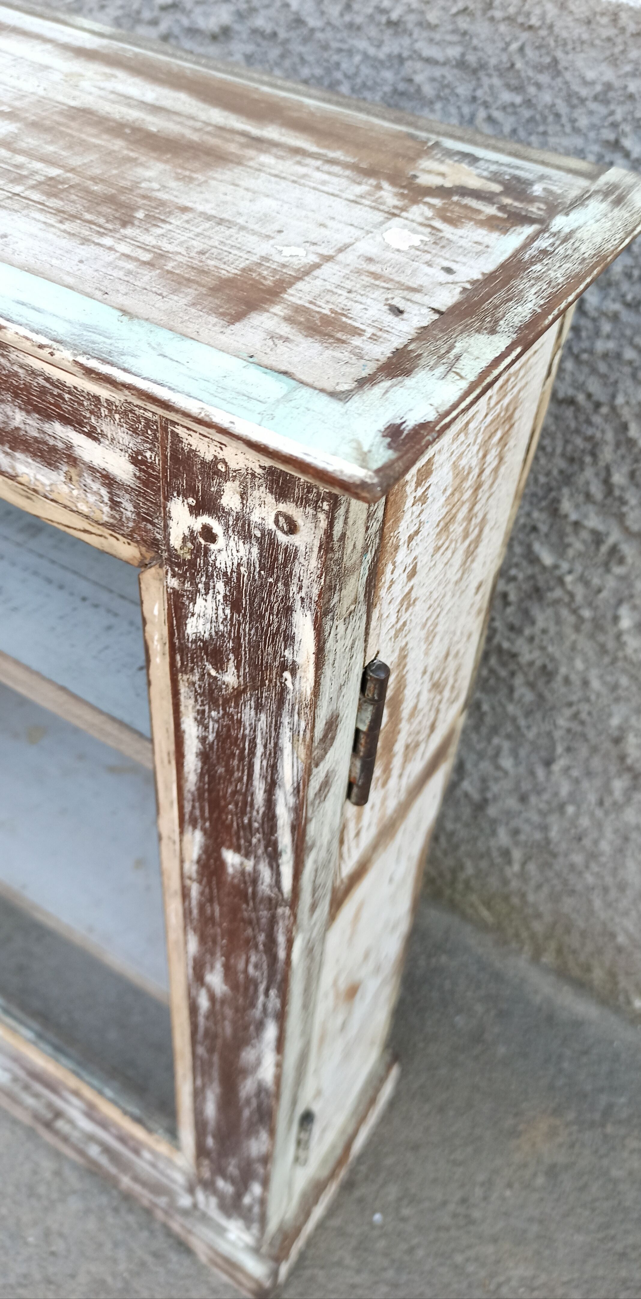 Old small wooden wardrobe with glass door