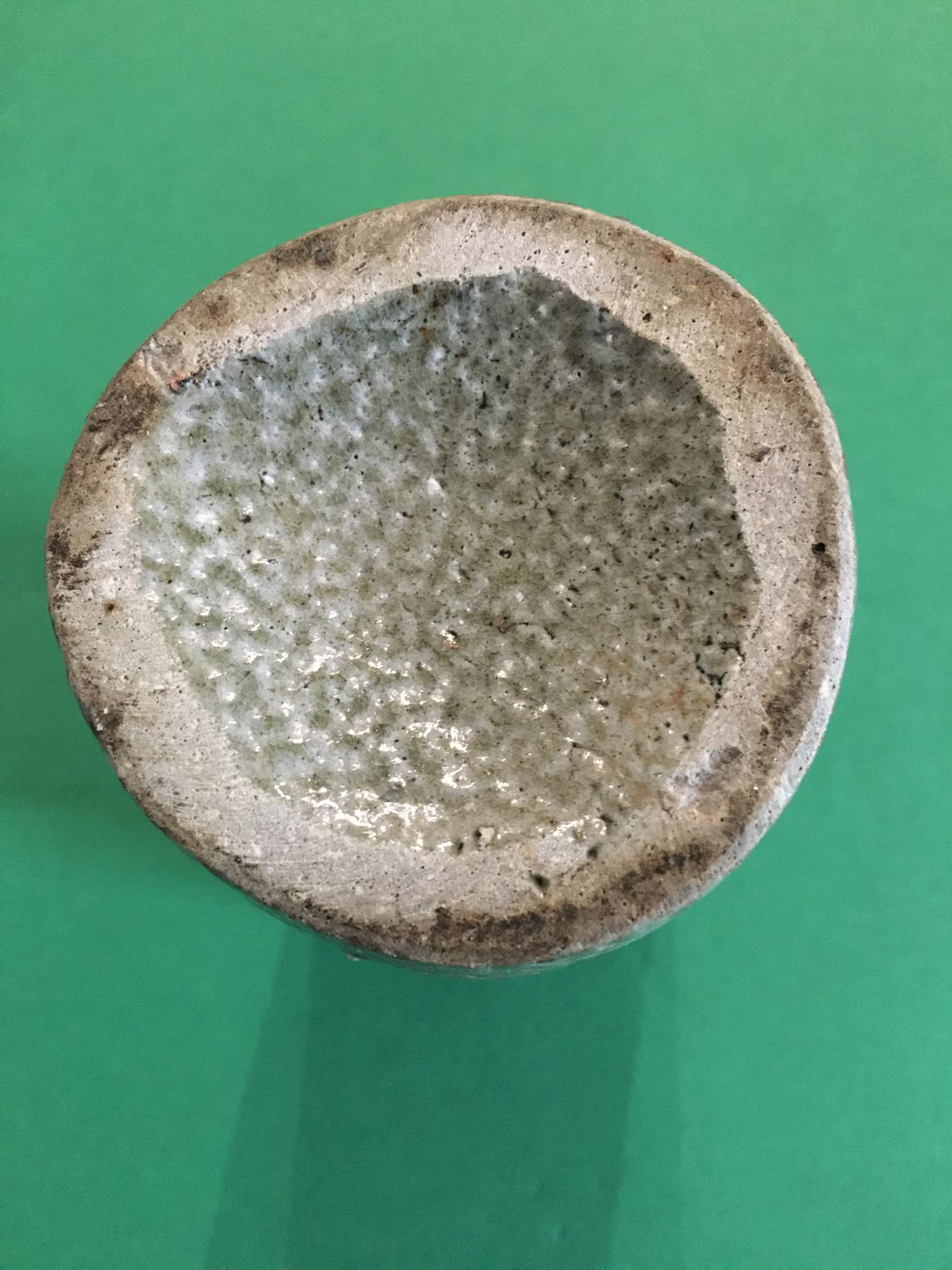 Sandstone scroll vase signed Jean Claude Monange, daisy motif