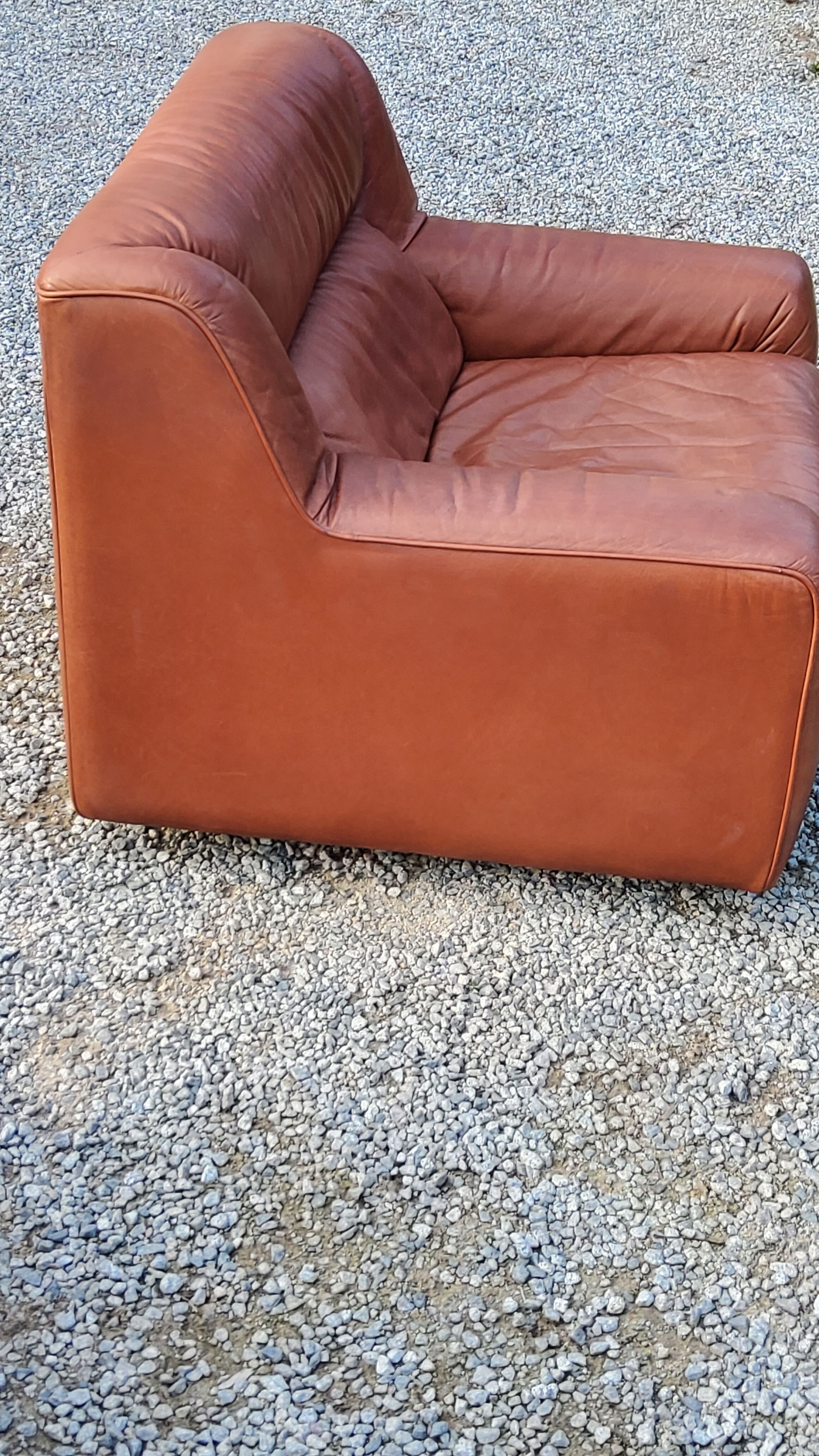 Pair of armchairs and De Sede sofa in cognac leather from the 70s/80s
