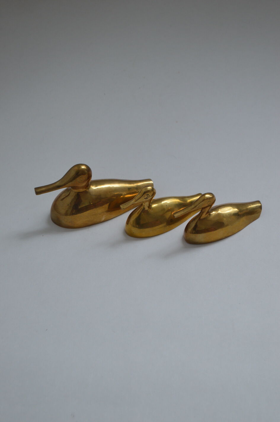 Suite of 3 brass ducks