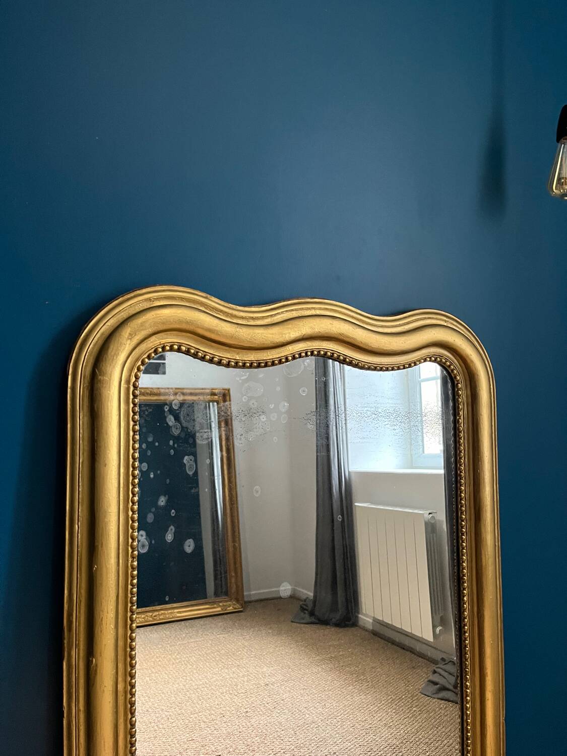 Louis-Philippe mirror 126.5cm/75.5cm gendarme hat shape, mercury glass