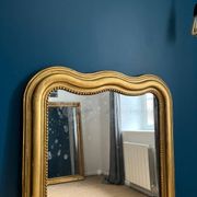 Miroir Louis-Philippe 126,5cm/75,5cm forme chapeau de gendarme, glace au mercure