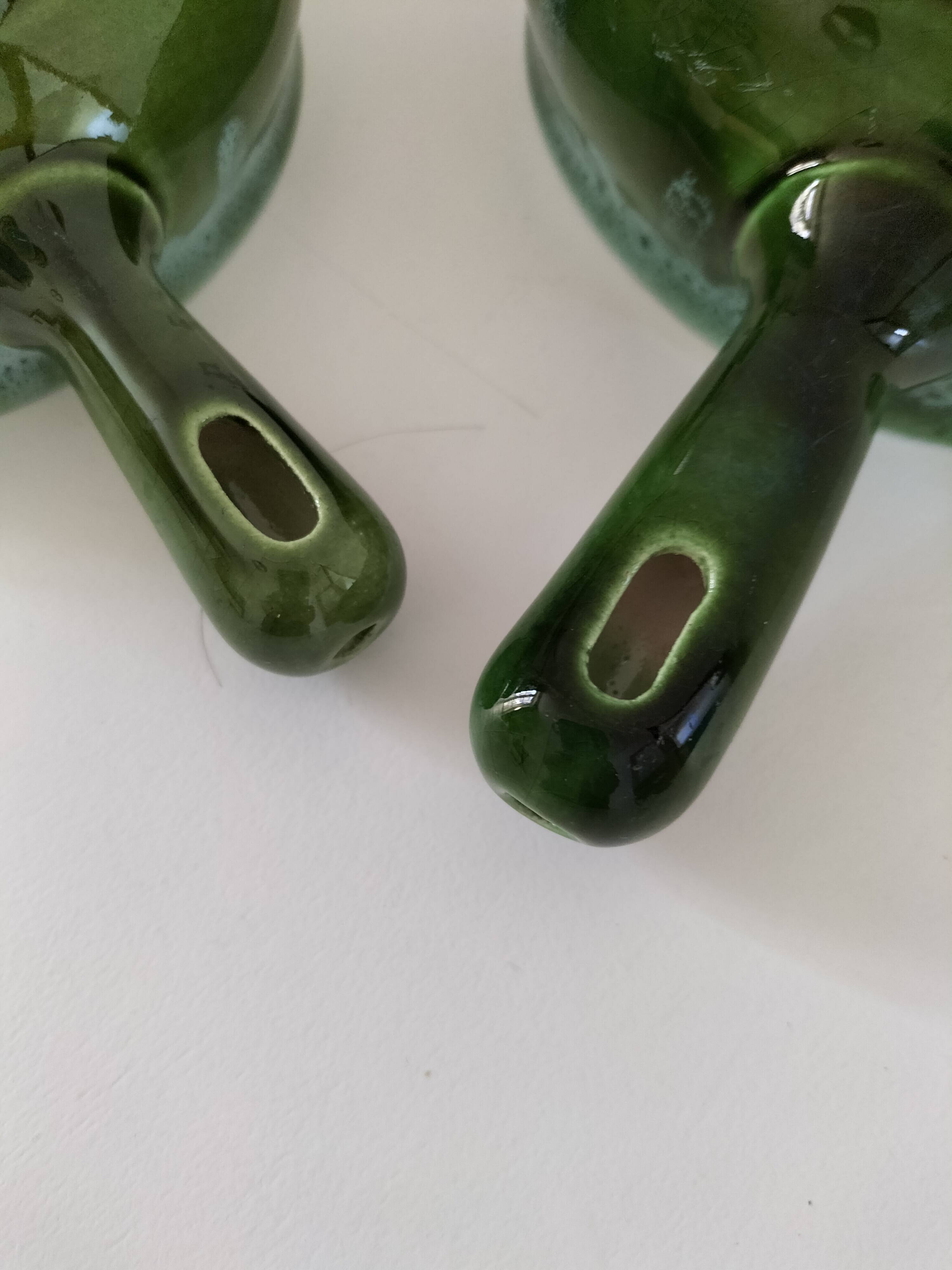 Duo of flowery caquelons