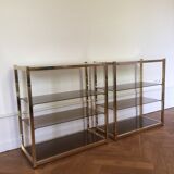 Pair of consoles brass shelves and smoked glass design Roche Bobois