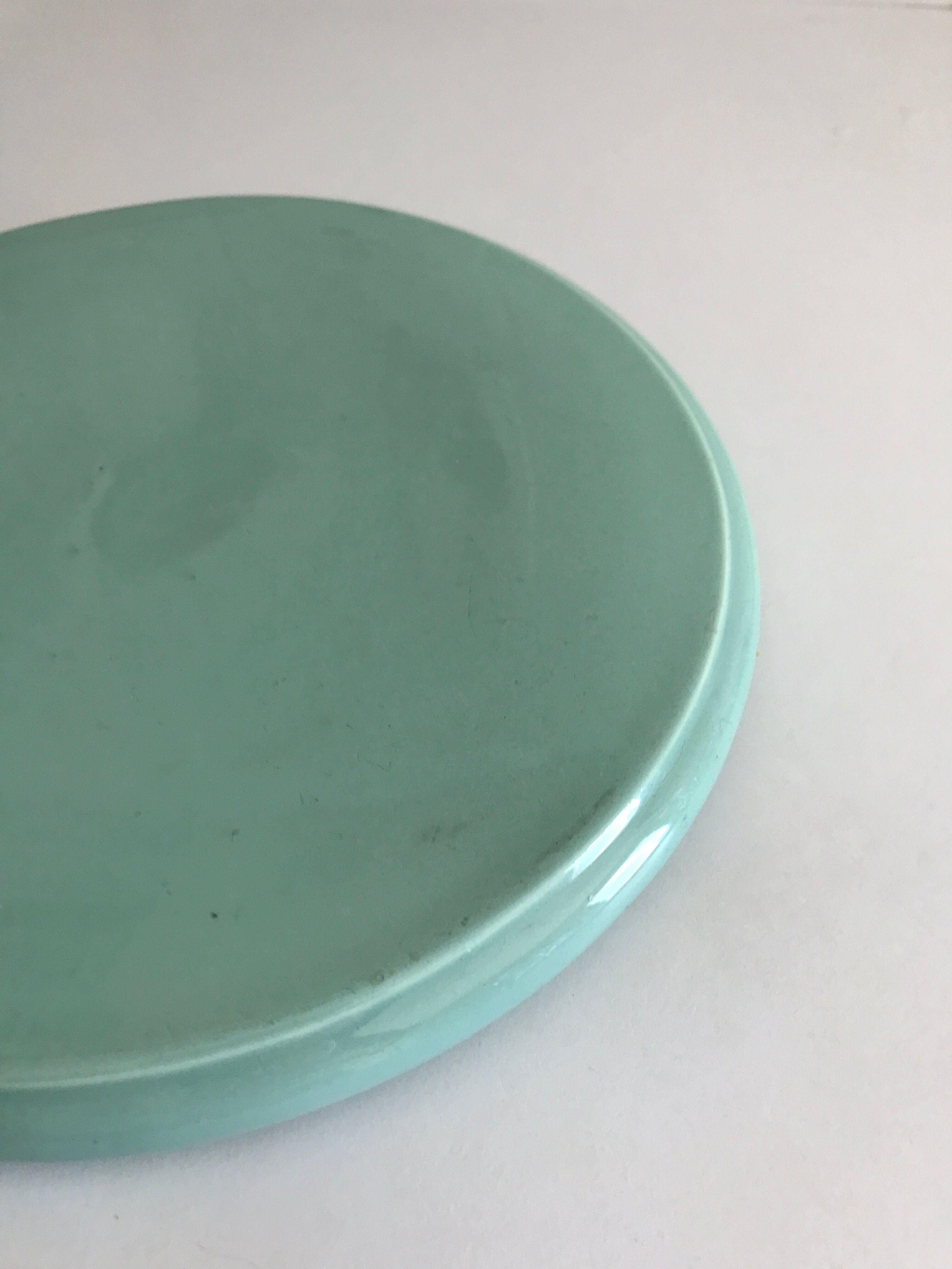 Mint green earthenware underside