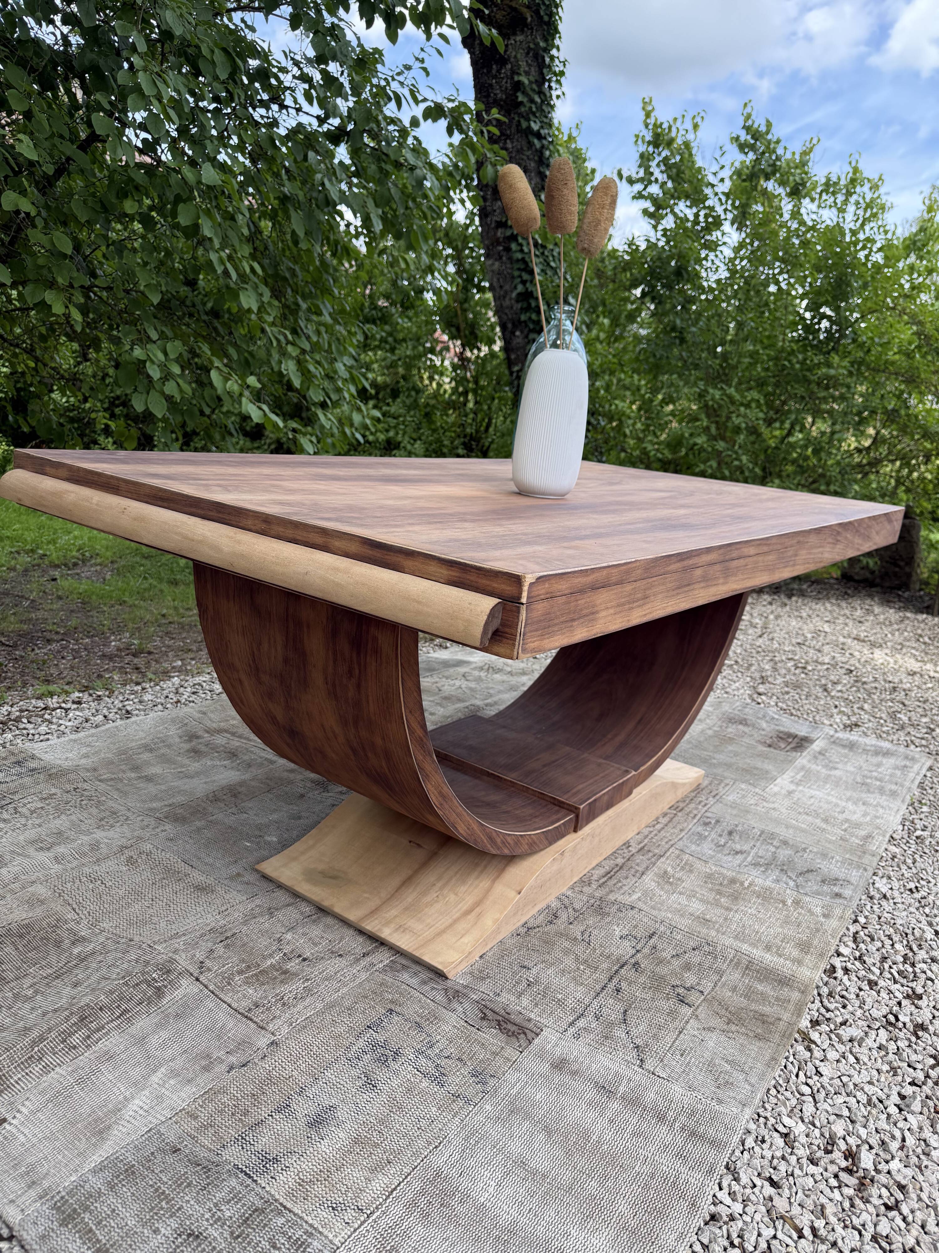 Renovated wooden table with extensions.