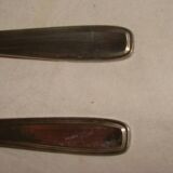 Couverts de table en métal argenté avec écrin