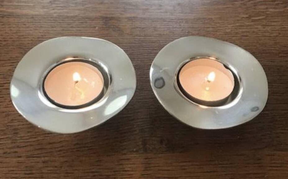 Pair of round candlesticks in silver metal, Danish design