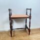 Small bench / stool in traditional English style, with side armrests.
