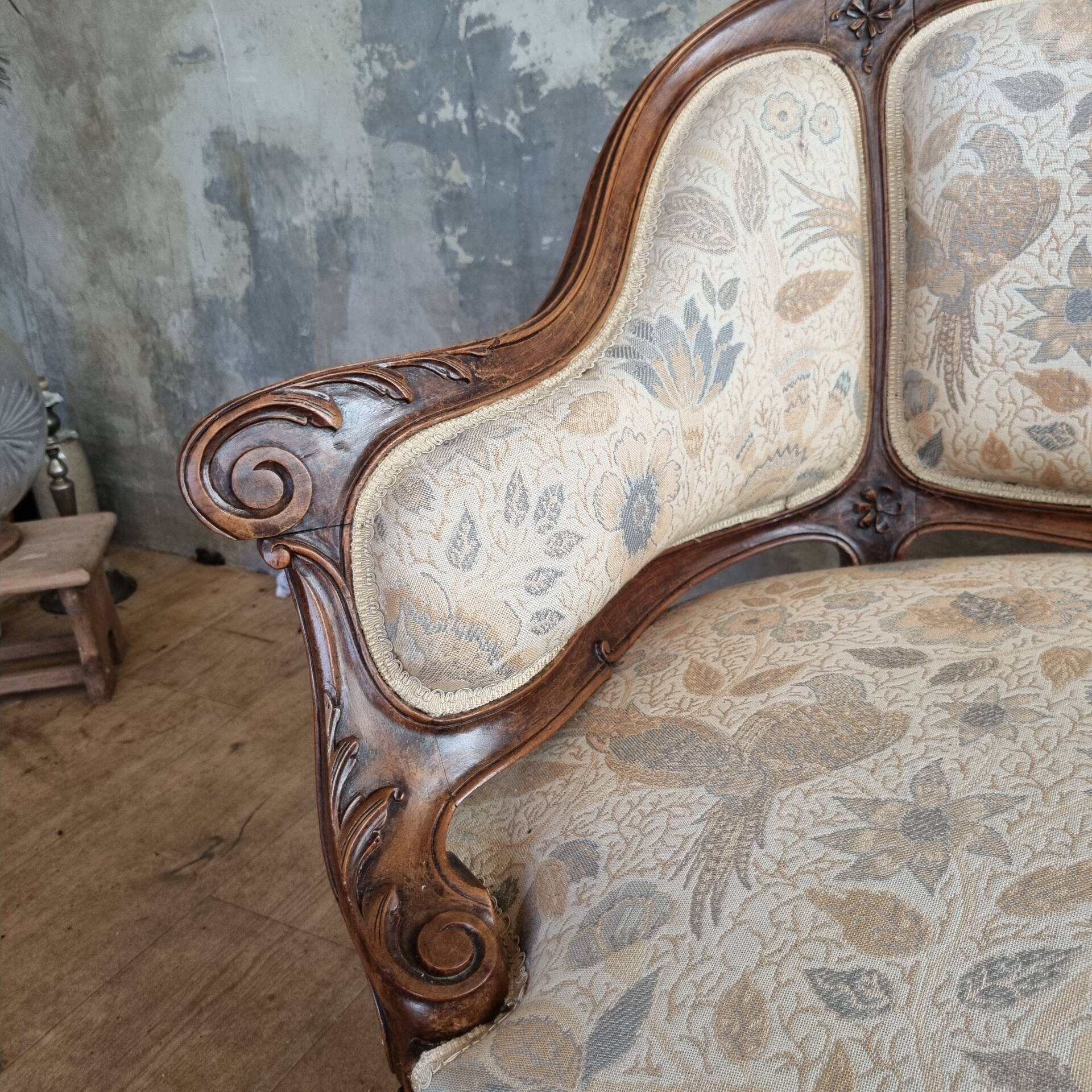 Small sofa or bench in Louis XV style, rococo.